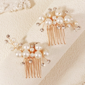 Élégante paire de peignes à cheveux dorés avec perles blanches et strass brillants
