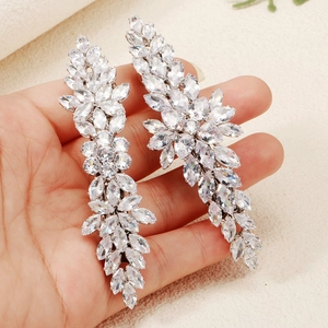 Elegant long silver tassel earrings with marquise-cut zircon stones for bridal or party wear