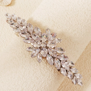 Close-up of luxury flower marquise zircon hair clip on elegant display stand