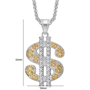 Detail showing 62mm high dollar sign hip hop pendant with gold accents and crystals