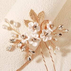 Handmade bridal hair pin with white flowers, gold leaves, pearls and crystals