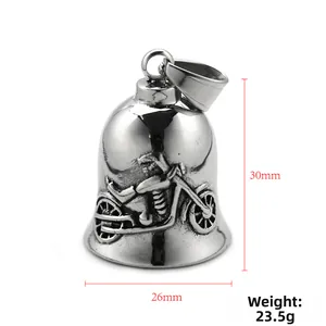 Macro detail of vintage stainless steel biker bell pendant showing motorcycle relief texture