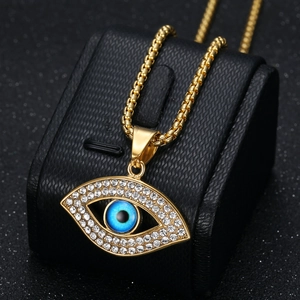 Collier hiphop avec pendentif oeil turc en acier inoxydable doré et cristaux blancs