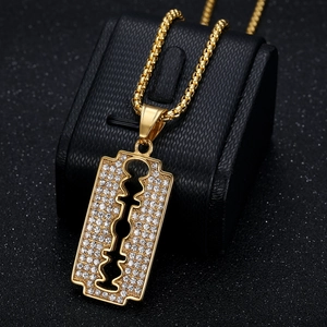 Iced out gold razor blade pendant necklace with sparkling rhinestones and box chain