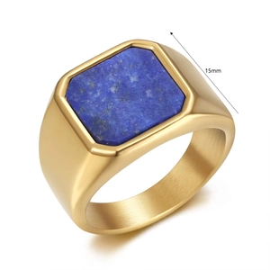 Macro detail of men's gold ring showing 15mm blue lapis lazuli stone inlay