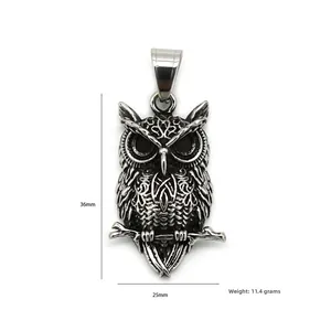 Vintage stainless steel owl pendant necklace with intricate feather details on white background