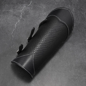 Punk style black leather bracer with embossed scale texture and adjustable buckles