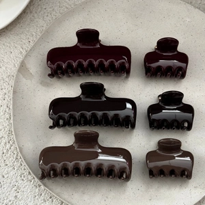 Glossy cherry red and chocolate brown shark hair clips in large and medium sizes