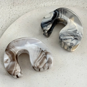 Minimalist ink texture U-shaped hair clips in charcoal gray and amber brown acetate finish