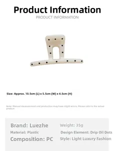 Size specifications for cream polka dot hair claw clip showing 10.5cm length dimensions