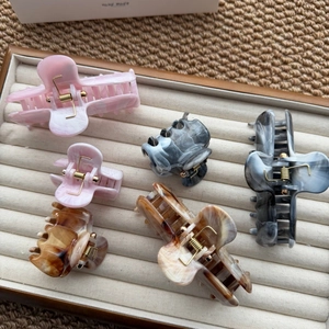 Ink marble acetate hair claw clips set in pink, grey and tortoise for elegant styling