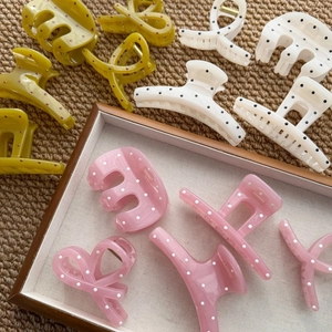 Polka dot hair claw set including bow and crescent styles in yellow, beige and pink