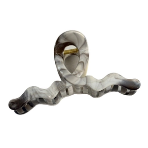 Large wavy hair claw clip with grey marble pattern and durable gold metal spring