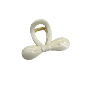 Creamy white bow-shaped hair claw clip with strong grip and gold metal spring for women