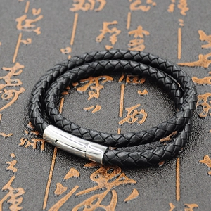 Men's double-layered black woven leather bracelet with polished stainless steel clasp