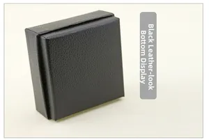 Macro detail of high-quality faux leather texture on the base of a black jewelry gift box