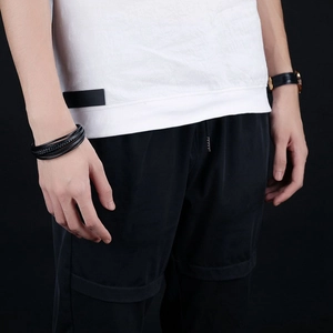 Multilayer black woven leather bracelet for men with stainless steel clasp on wrist