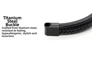 Detail of matte black titanium steel clasp on multilayer braided leather bracelet