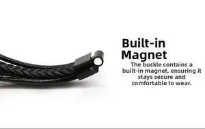 Detail of multi-layer leather braid bracelet showing magnetic metal clasp and texture