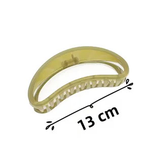 Detail view of 13cm hollow half-moon hair claw clip in transparent olive green acrylic