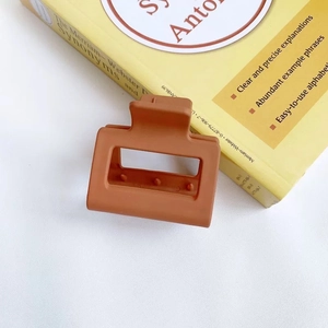 Elegant matte brown rectangular hair claw clip for women in a minimalist Korean style