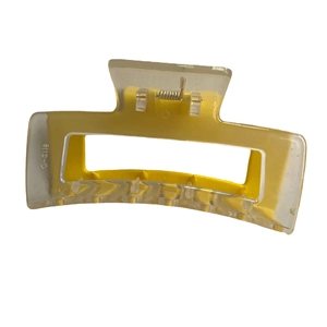 Large rectangular bicolor hair claw clip in yellow and transparent acrylic with spring