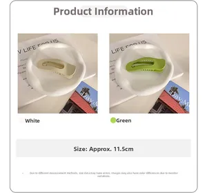 Detail view of 11.5cm cream and green matte hair claws with non-slip design