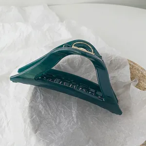 Elegant vintage French style deep green glossy hair claw clip for bun hairstyles