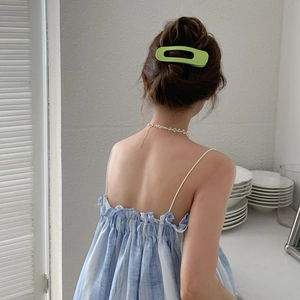 Minimalist matte green oval hollow hair claw clip for elegant back head hair styling
