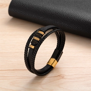 Bracelet pour homme en cuir tressé noir avec fermoir magnétique en acier doré et noir