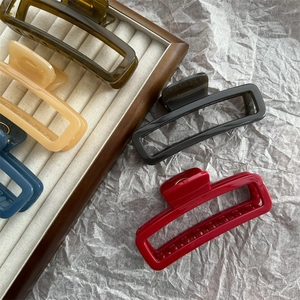 Rectangle hair claw clips in brown, beige, blue, black, and red glossy resin finish