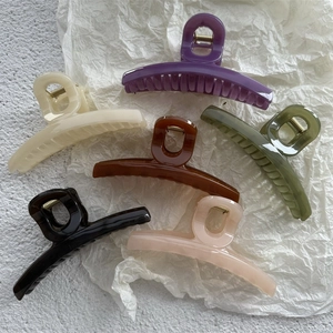 6-pack of jelly-colored large shark hair clips in assorted glossy elegant colors