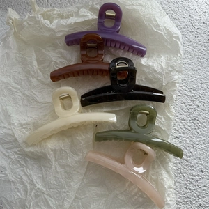 Detailed collection of elegant jelly-colored hair claws in six diverse pastel shades