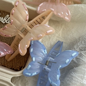 Elegant Korean butterfly hair claw clips with satin ribbon trim in pastel colors