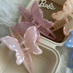 Sweet butterfly hair claw clips with woven ribbon detail in macaron colors for women