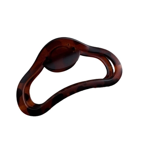 Elegant large matte brown tortoiseshell hair claw clip with hollowed-out streamline design
