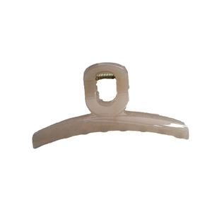 Elegant champagne jelly large hair claw clip for women featuring a minimalist matte finish