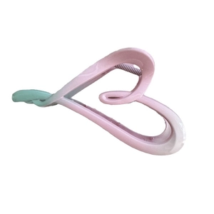 Pink and mint green gradient heart-shaped hair claw clip with a matte finish on white background