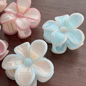 Pinces à cheveux fleurs gelées translucides en rose et bleu pastel avec design 3D