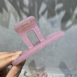 French style pink translucent thick PC hair claw clip with a secure metal spring