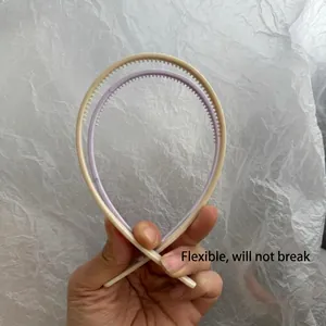 Flexible candy colored non-slip headbands with teeth in beige and purple colors