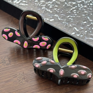 Set of two colorful polka dot shark hair clips in glossy resin with elegant ring handles