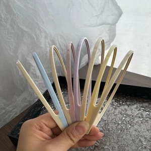 Detail showing non-slip inner teeth of slim candy-colored headbands for women