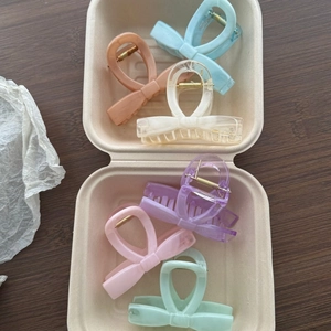 Set of 6 marble textured bow-shaped hair claws in assorted pastel colors for women