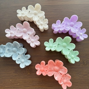 Set of six marble texture camellia flower hair claws in assorted pastel macaron colors