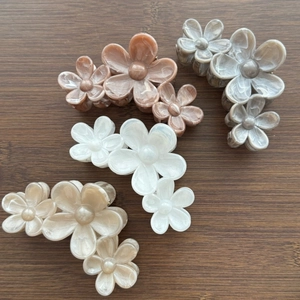 Floral hair claw clips set in marble pearlescent finish with four elegant colors