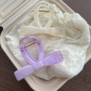 Elegant marble pattern bow hair claws in cream white and light purple colors