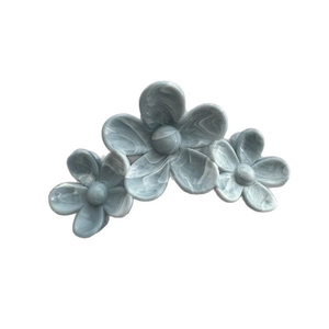 Three-flower hair claw clip with blue marble texture resin and elegant petal design