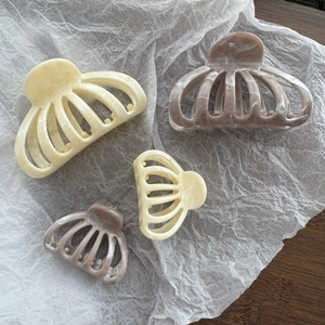 Elegant marble pattern acetate hair claw clips in cream and taupe for women