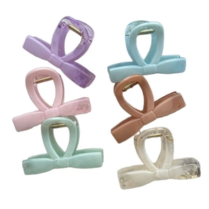Set of 6 elegant marble texture bow-shaped hair claw clips in assorted pastel colors